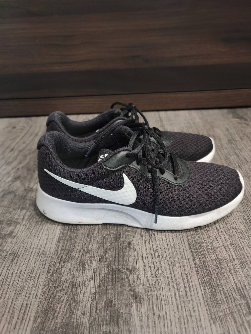 Well Worn Nike Tanjun Sneakers
